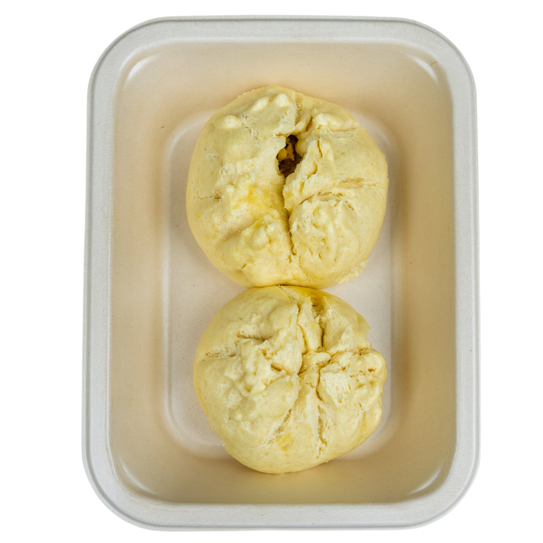 Lao Dumplings in a compostable meal tray.