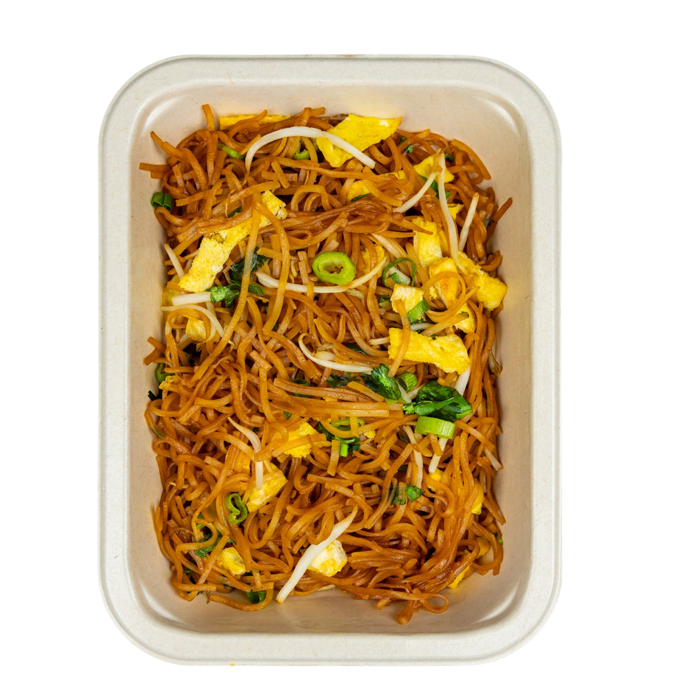 Caramelized rice noodles in a compostable meal tray.