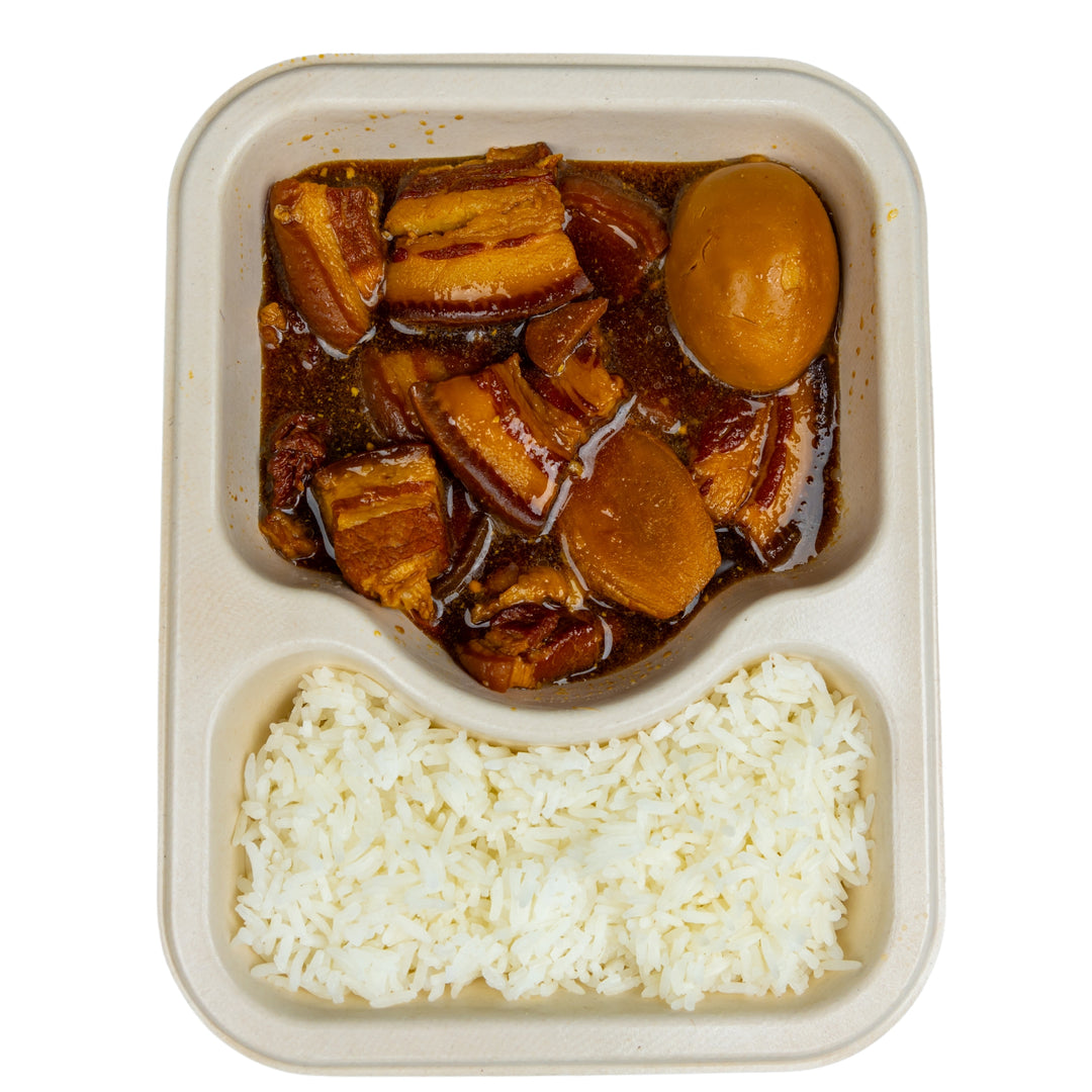 Pork belly stew in a compostable meal tray.