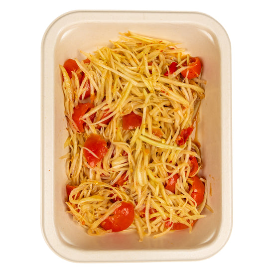 Spicy Lao green papaya salad in a compostable meal tray.